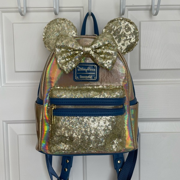 Loungefly Handbags - Loungefly Gold and Blue Sequin Backpack